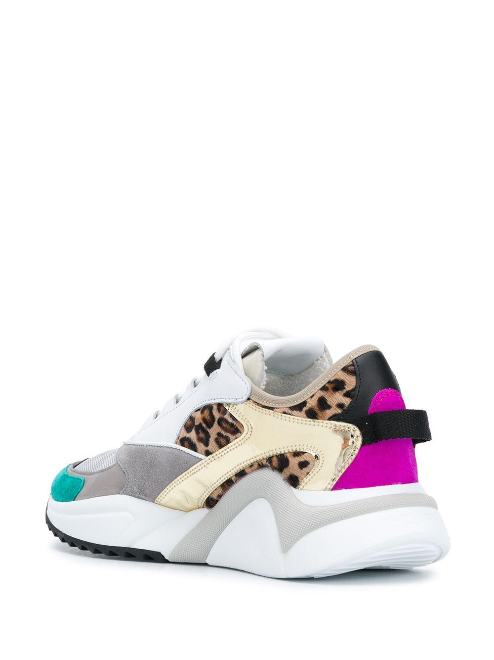 Sneakers runner bianca con fantasia animalier