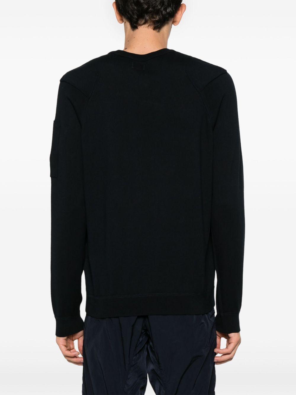 Maglione in filo blu logo lens sul braccio