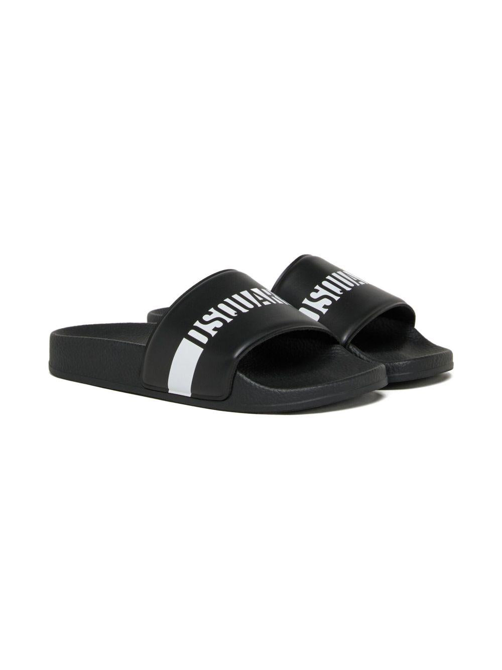 Ciabatte slip-on con logo a righe DQ3383KF025 DQ900 DSQUARED KIDS