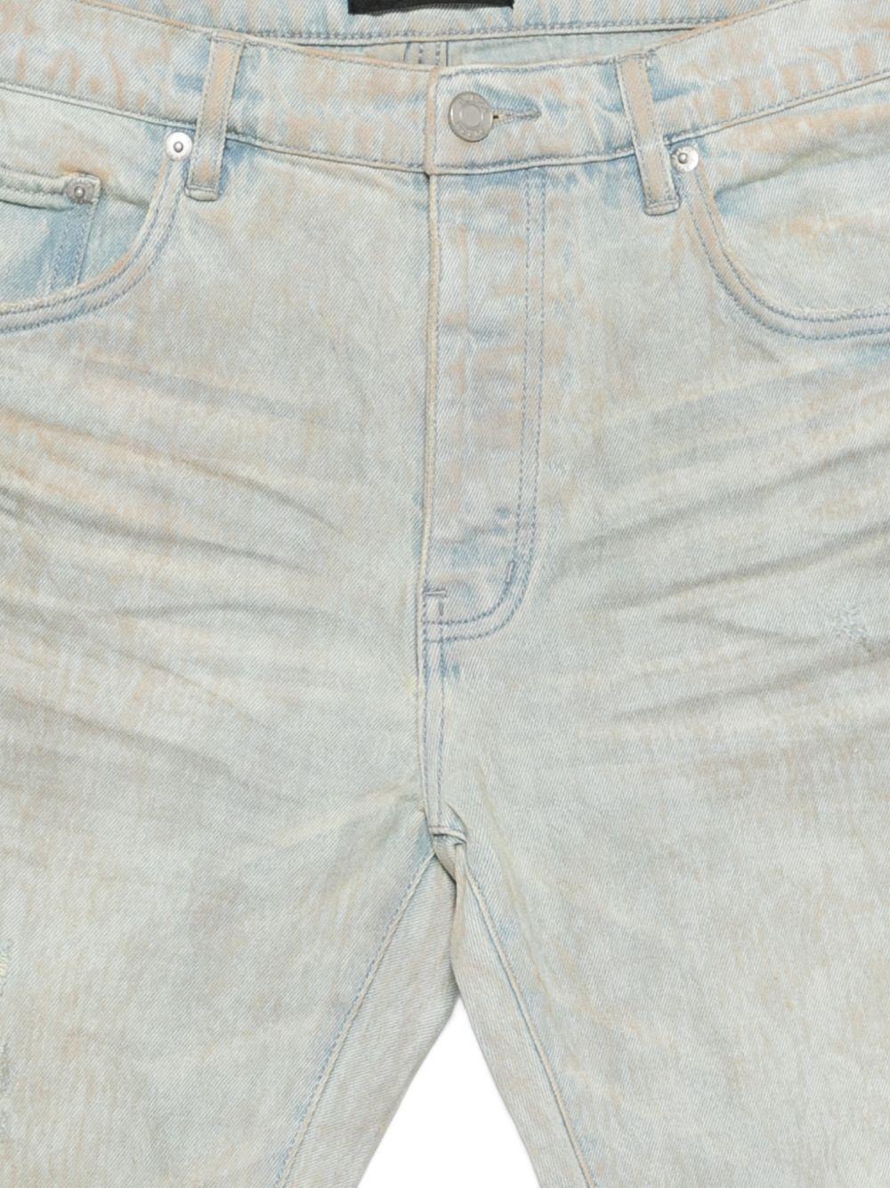 Jeans con strappi e lavaggio delavé P001SKFM126 TAN PURPLE BRAND