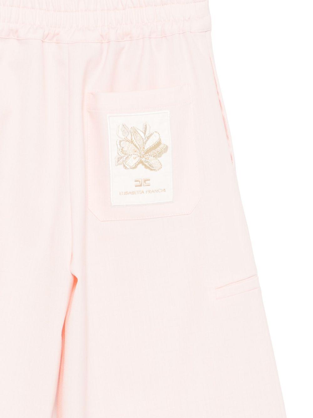 Pantalone a gamba ampia rosa con ricamo