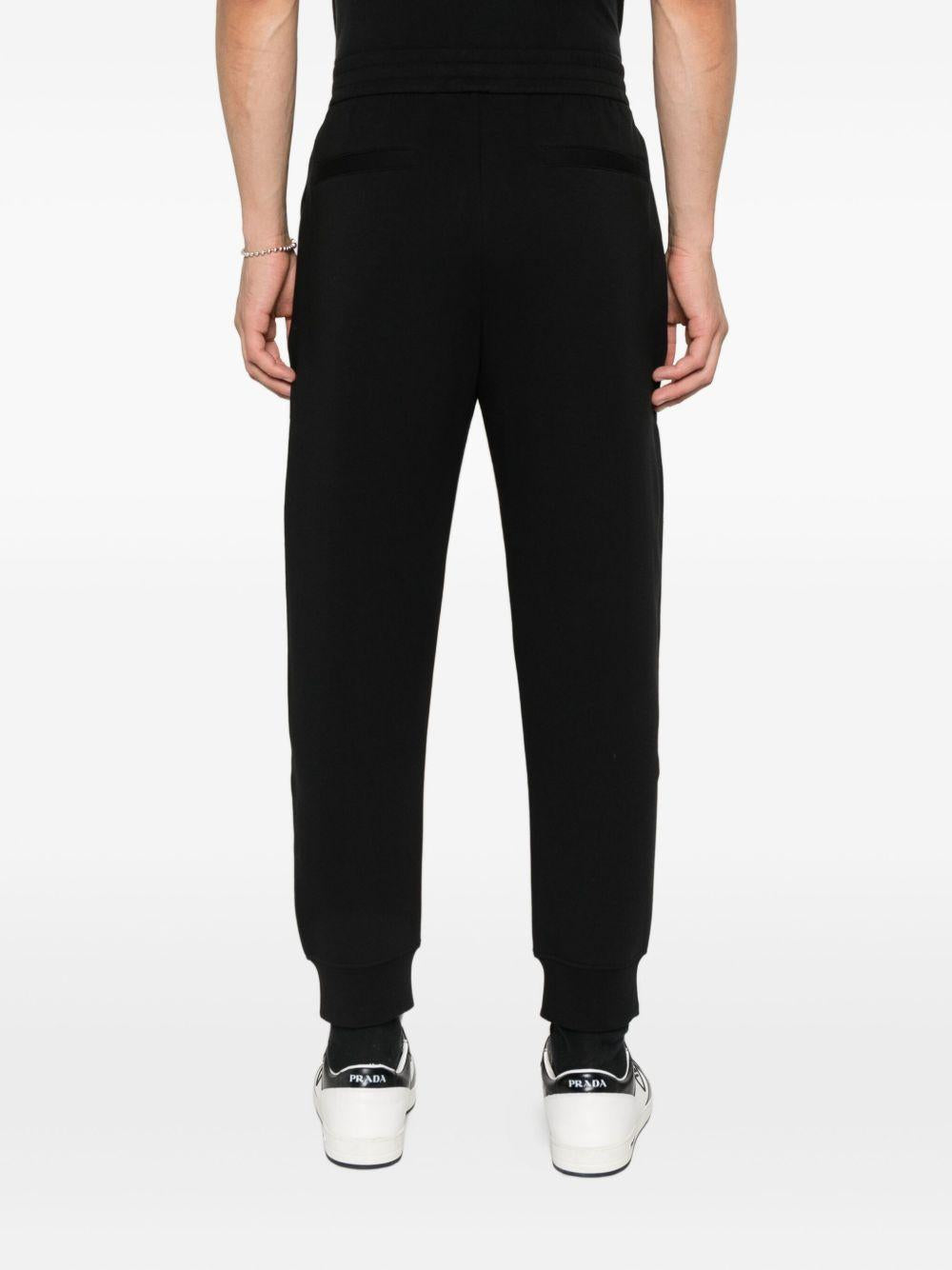 Pantaloni neri da tuta con logo ricamato e polsini 8N1PT01JHSZ UC001 EMPORIO ARMANI