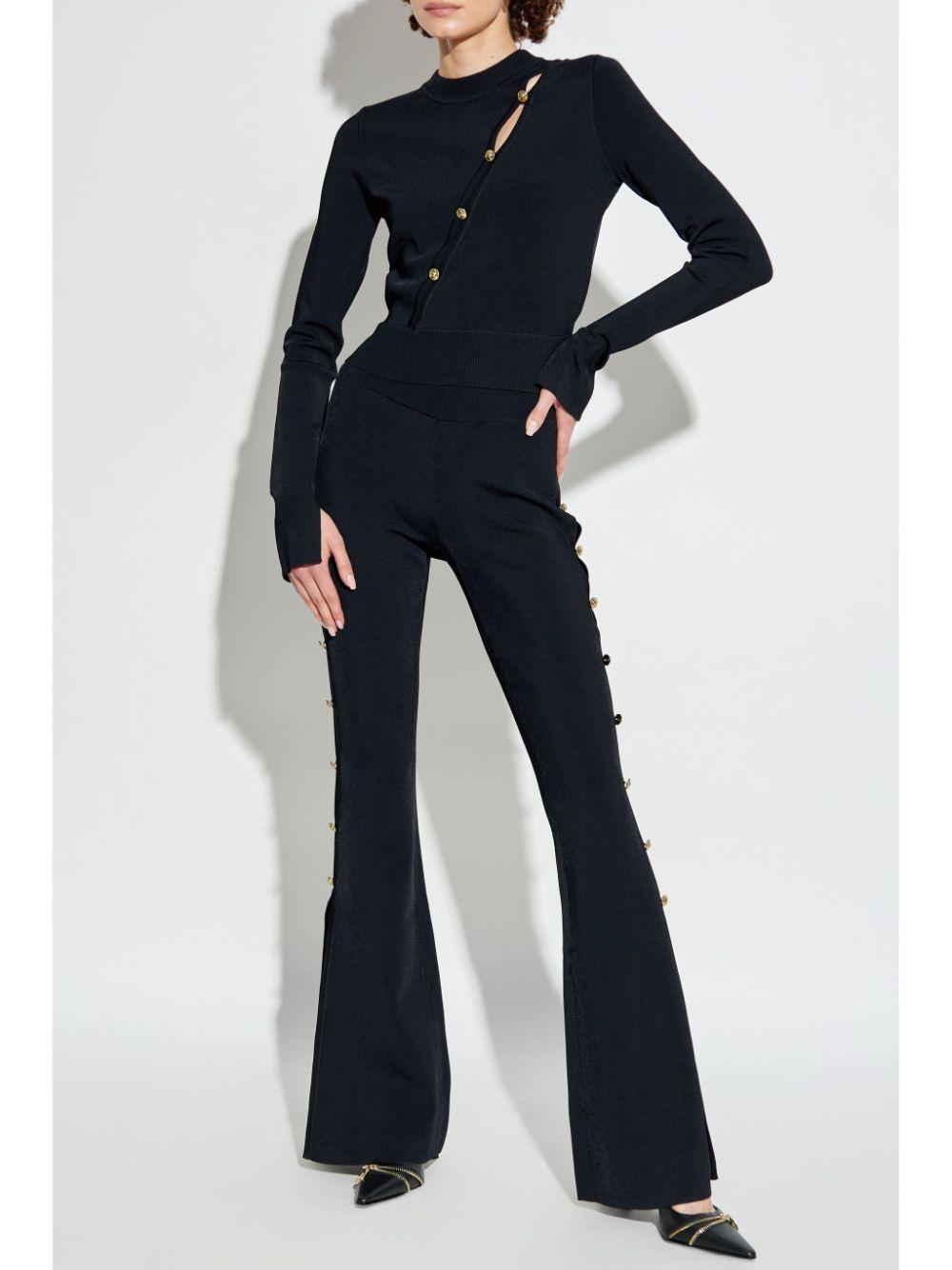 Pantalone nero cut-out laterali 77HAAMB4CM61H 899 VERSACE JEANS