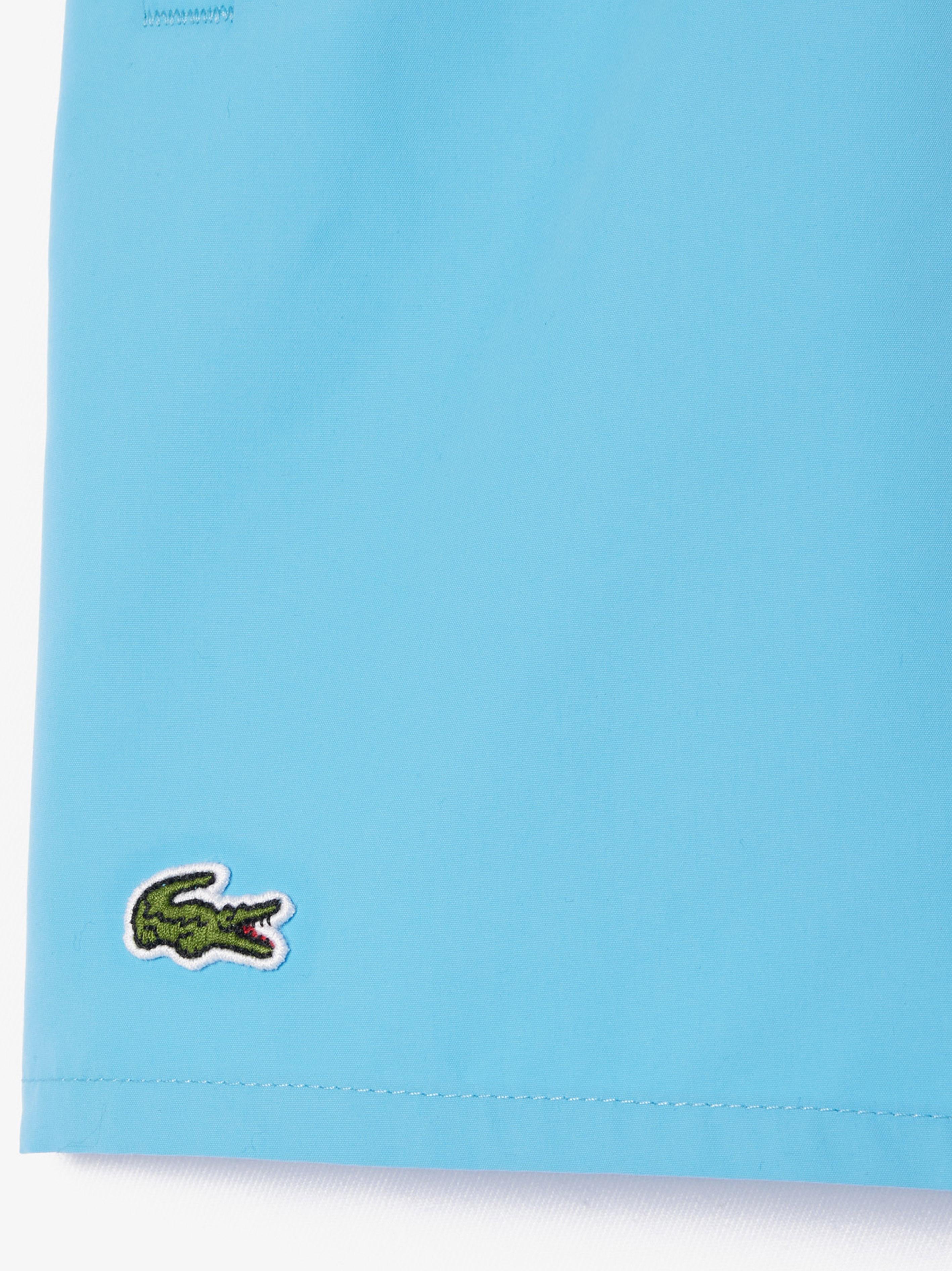 Costume azzurro tinta unita MJ4756 INI LACOSTE KIDS