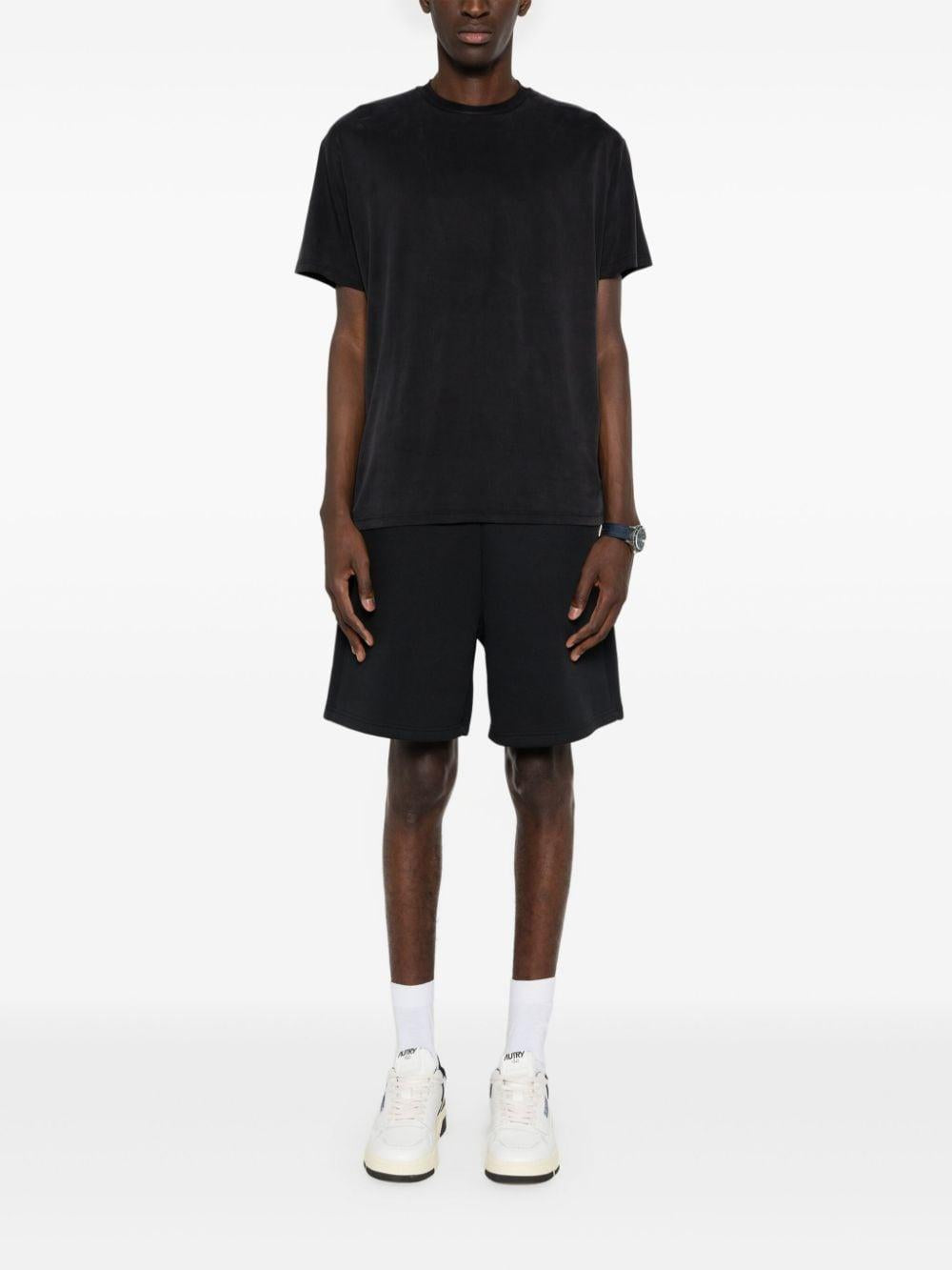 T-shirt nera oversize