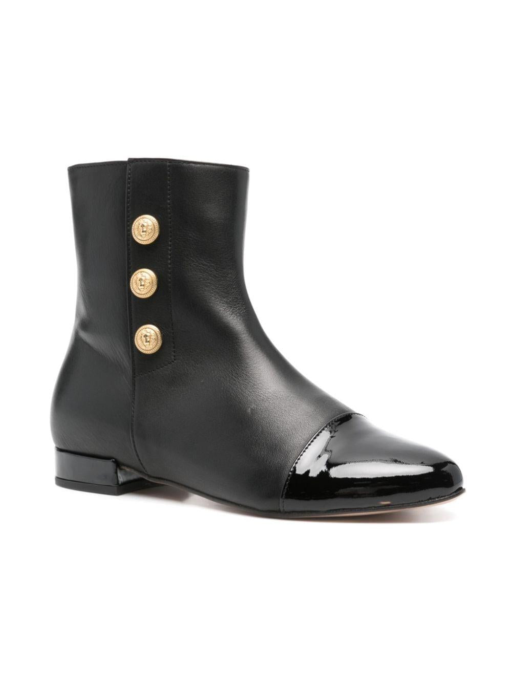 Stivaletto nero con punta lucida