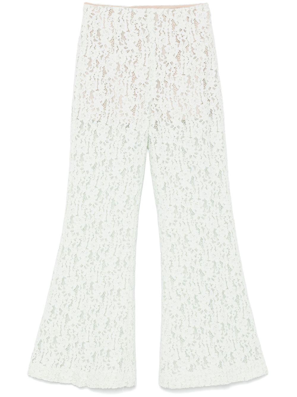 Pantaloni flare in pizzo floreale verde acqua