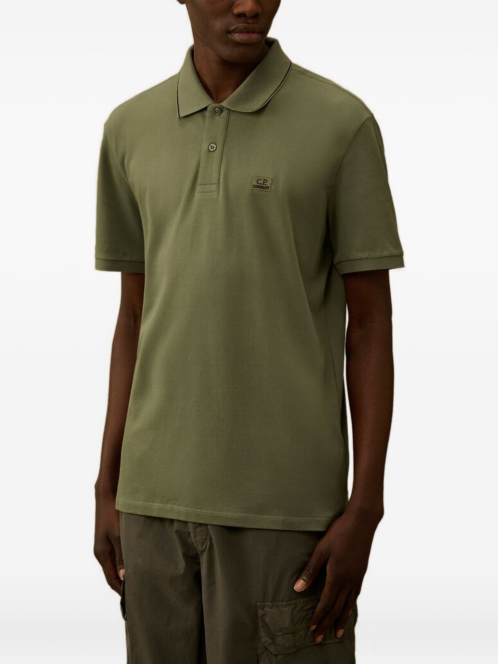 Polo a maniche corte con logo patch 20CMPL722A005263W 668 CP COMPANY 