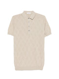 Polo in cotone a rombi con maniche corte