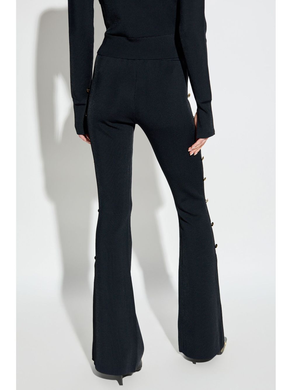 Pantalone nero cut-out laterali 77HAAMB4CM61H 899 VERSACE JEANS 