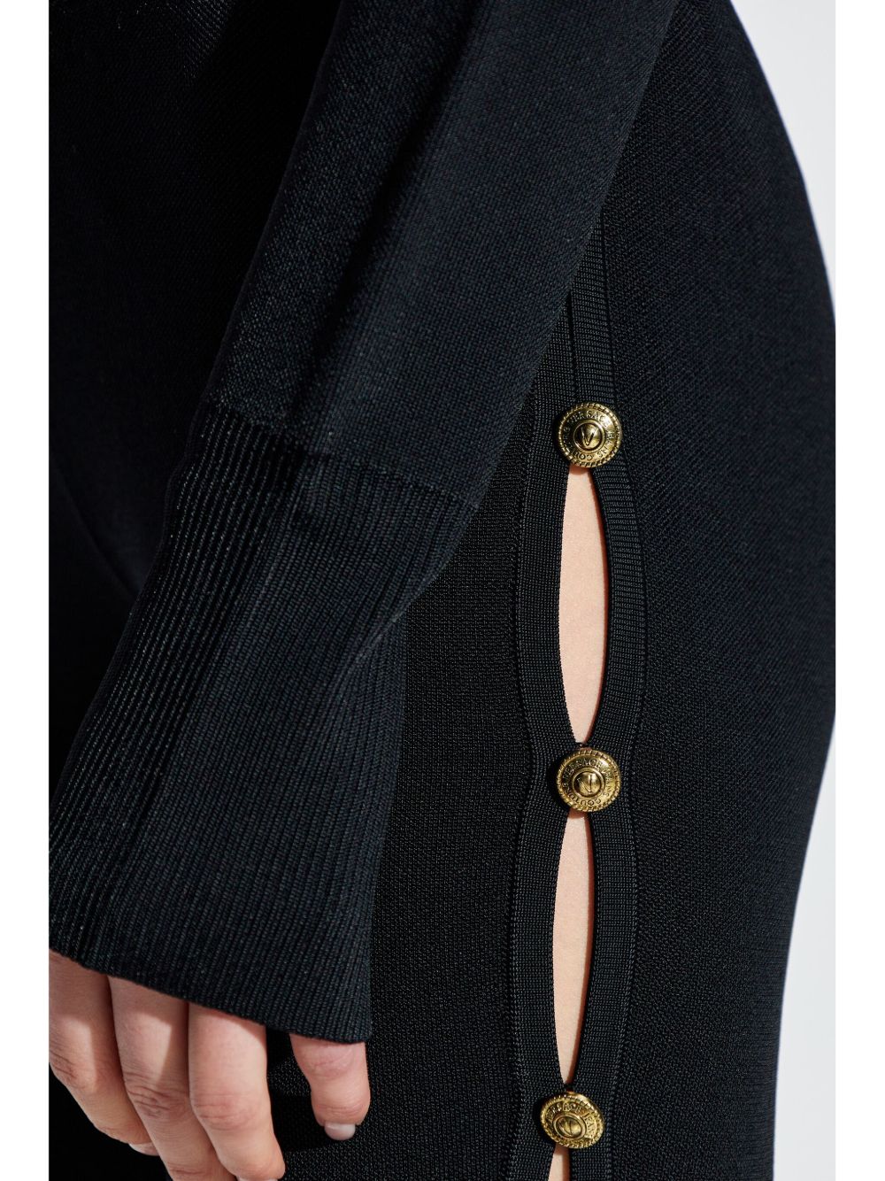 Pantalone nero cut-out laterali 77HAAMB4CM61H 899 VERSACE JEANS 