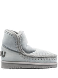 Light grey ankle boots with decorative stitching