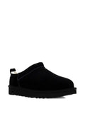 Scarpe neri in camoscio con shearling e punta tonda