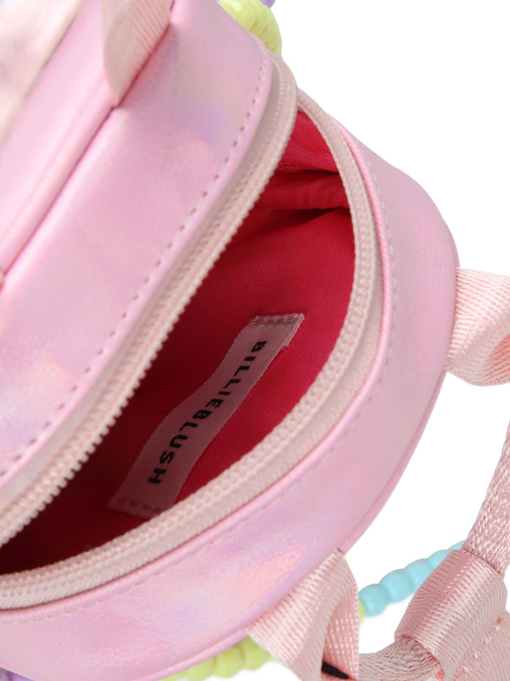 Unicorn handbag. Iridescent pinkish simili. Glow nel dark unicorn illustrazione, puff effect. Small handles con snap. Fringes sul fondo. Facets beads spalla strap. Chiusura con zip. A righe woven label. Dimensions : 15x10,5x5 cm. U22526 467 BILLIE BLUSH KIDS 