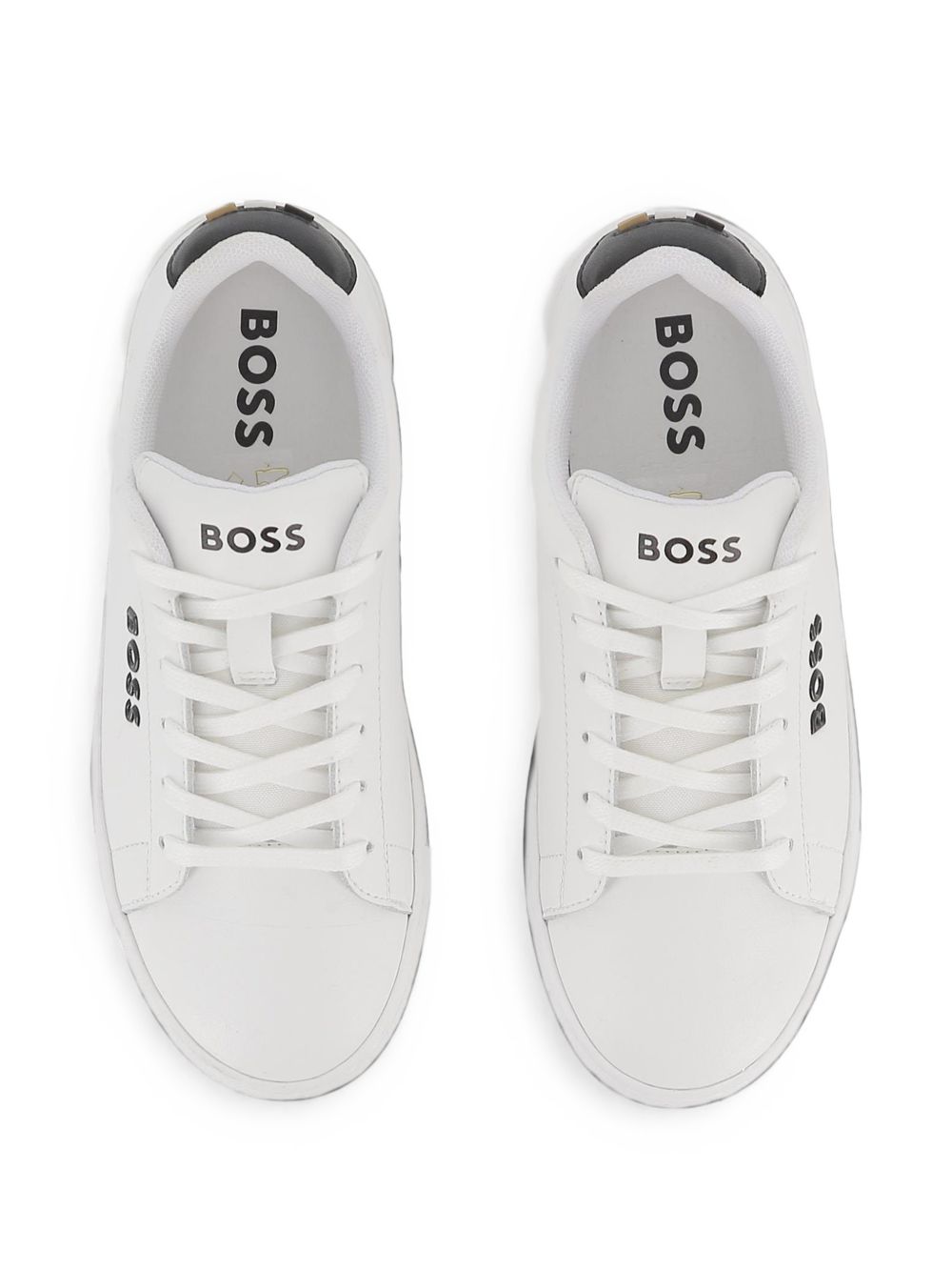 Sneakers in cow nappa leather e textile. Brand printed sul side, al retro e sul tongue. Lace up chiusura. Fodera in textile. Insole in breathable microfiber. Tpr outsole. Mineral tanning. J53248 10P BOSS KIDSWEAR 