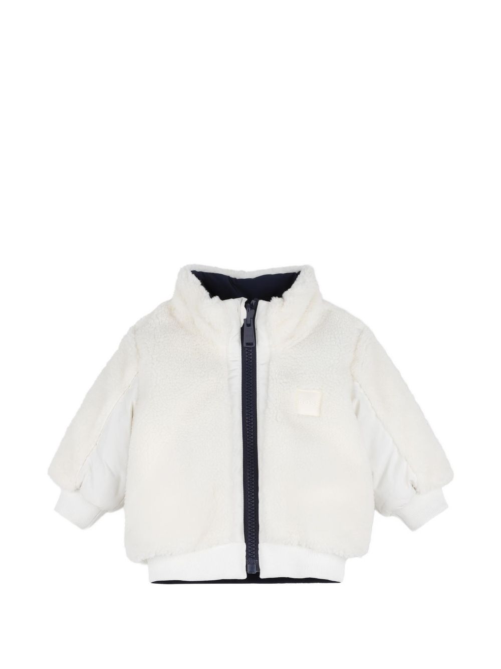 Reversible piumino. One side in sherpa con chiusura con zip, boss badge sul chest, e two side tasche. Other side in nylon con chiusura con zip, boss logo sul chest, e two patch tasche sul davanti. J53505 120 BOSS KIDSWEAR 