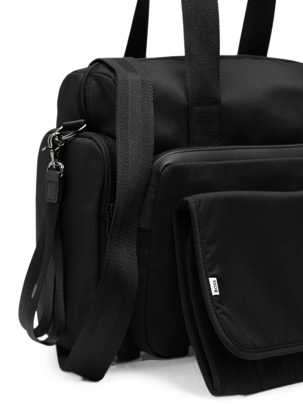 Changing bag in matt polyester e gum effect simili (in details). Double b all-over stampa inside logo on davanti. Tricolor woven tab. Changing mat + 2 stroller straps + removable strap e handles in textured jacquard. External large tasche. Tasche on  J53561 09B BOSS KIDSWEAR 