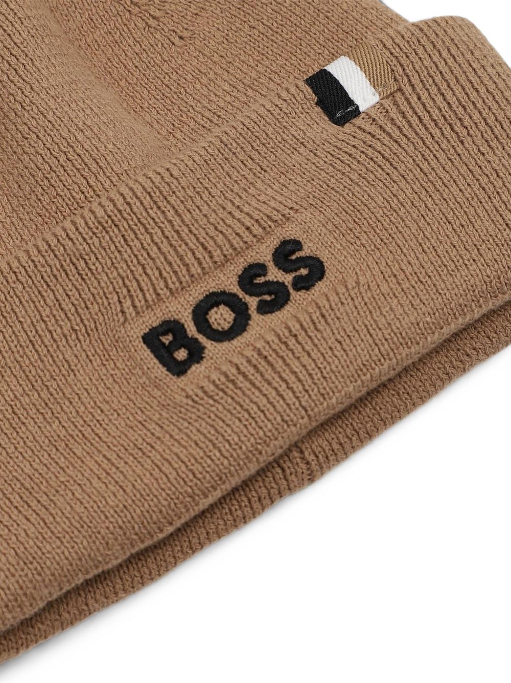 Knit beanie in double layer con pompom. Branded ricamo. Woven label con iconic stripes. J53567 269 BOSS KIDSWEAR 