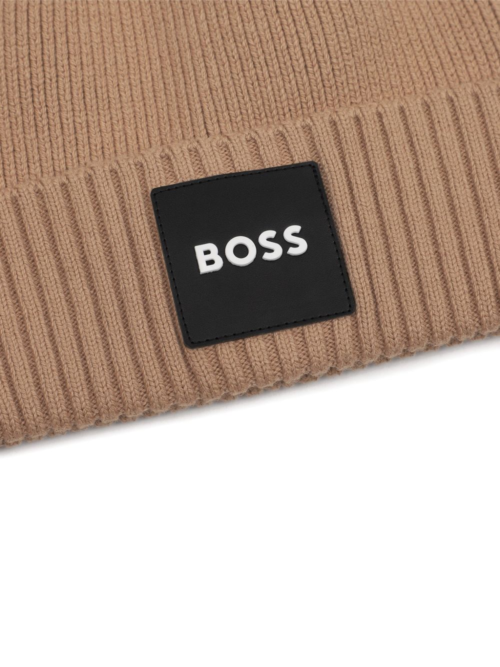 Knit beanie con branded badge. Mainly made in cotton, co/pa. Matched snood j53590 J53583 269 BOSS KIDSWEAR 