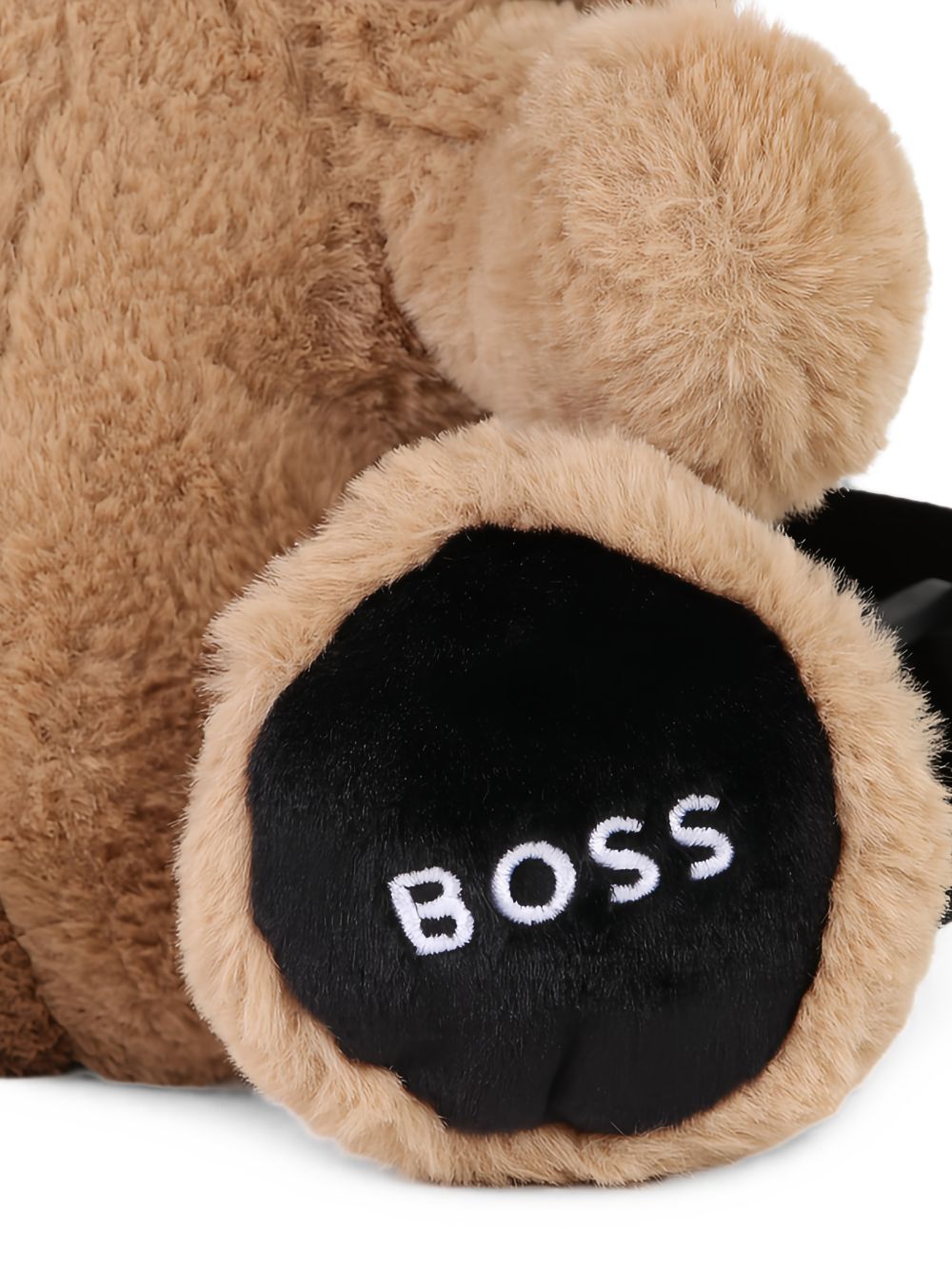 Red panda teddy backpack in eco-pelliccia. Branded ricamo under feet. Zip chiusura sul retro of red panda. Branded jacquard regolabile straps. Dimensions : 28x21x16cms. Sold in a branded woven bag. J53648 269 BOSS KIDSWEAR 