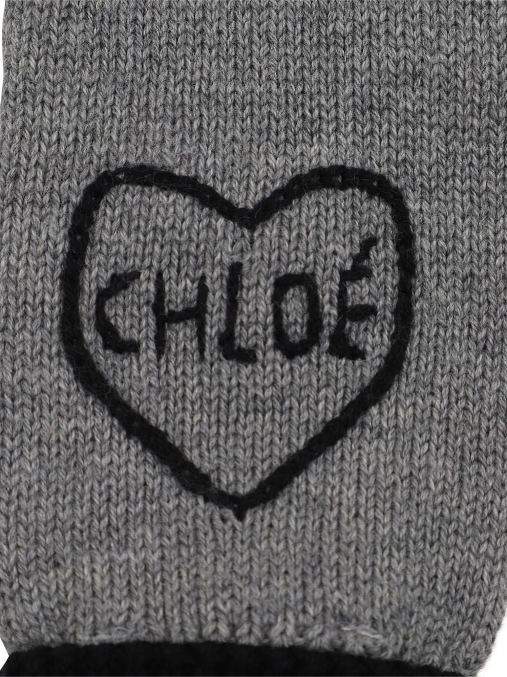 Gloves, containing cotton from organic farming e wool, con chloé logo ricamato on davanti. C21315 A46 CHLOE KIDS 