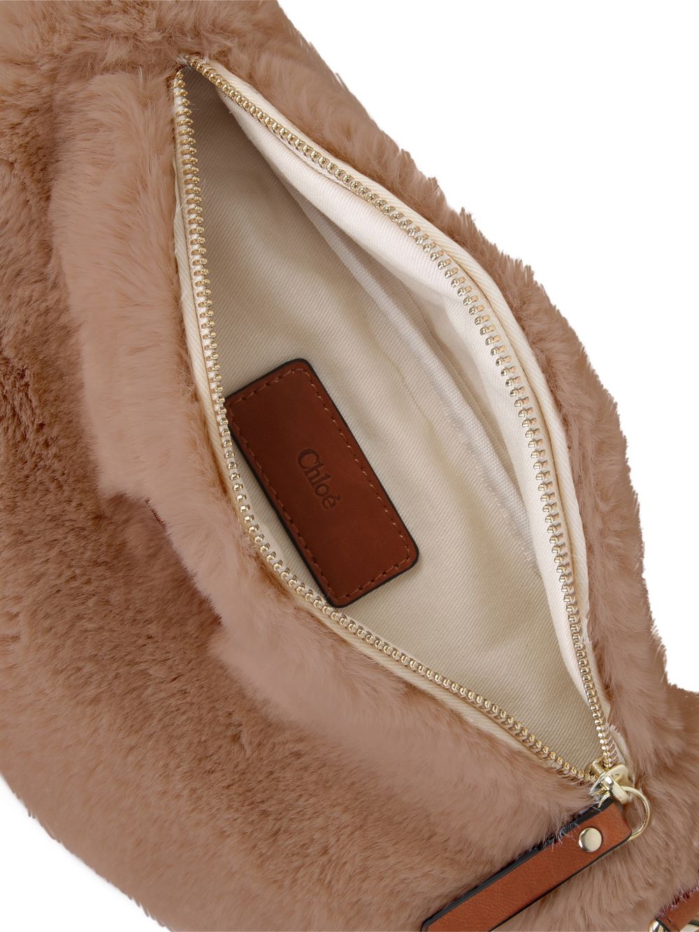 Faux-fur bumbag, con interchangeable chloé branded grosgrain strap, chloé silicone badge on davanti, cotton twill fodera, zipped chiusura, strap pieces, zip pullers e inside label in goat leather. Dimensions: w23xh13xd6cm. Strap length: 65cm. C21324 31F CHLOE KIDS 