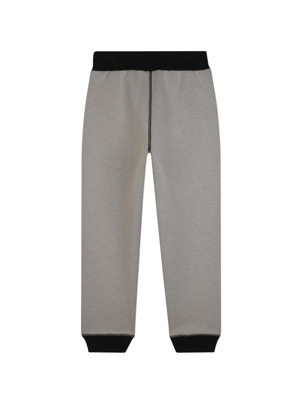 Reversible pantaloni in doble jersey, 86% polyester 10% viscose 4% elastane. One black side in jersey piqué effect con tasche e printed dkny logo. Other side in beige jersey con davanti tasche e printed dkny logo. D62866 P90 DKNY KIDS 
