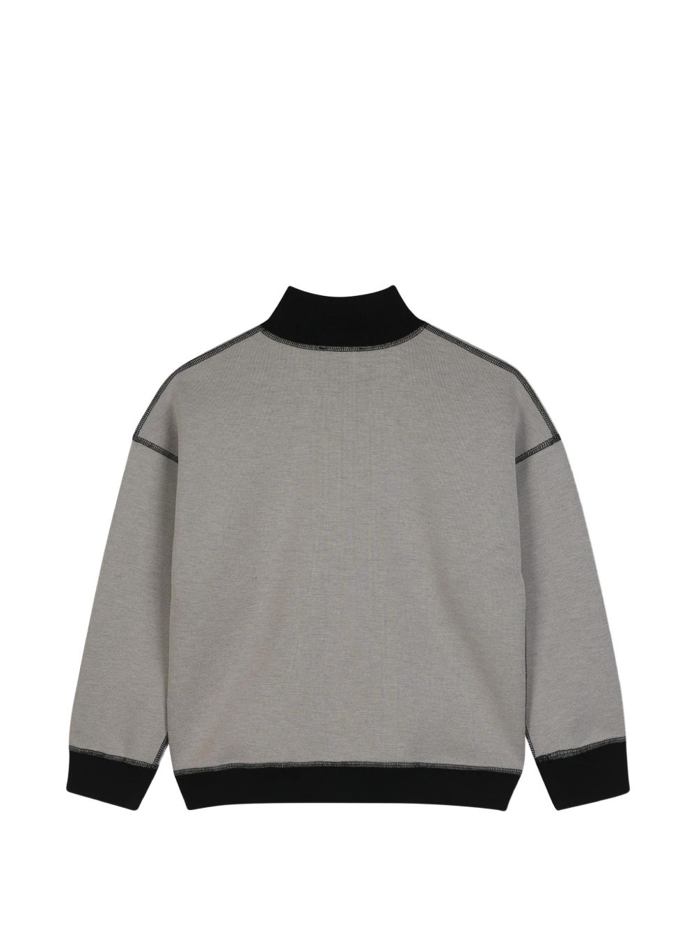 Reversible sweatshirt in doble jersey, 86% polyester 10% viscose 4% elastane, con high collar. One black side in jersey piqué effect con printed dkny logo at chest. Other side in beige jersey con dk logo in flocking technic at chest. D62868 P90 DKNY KIDS 