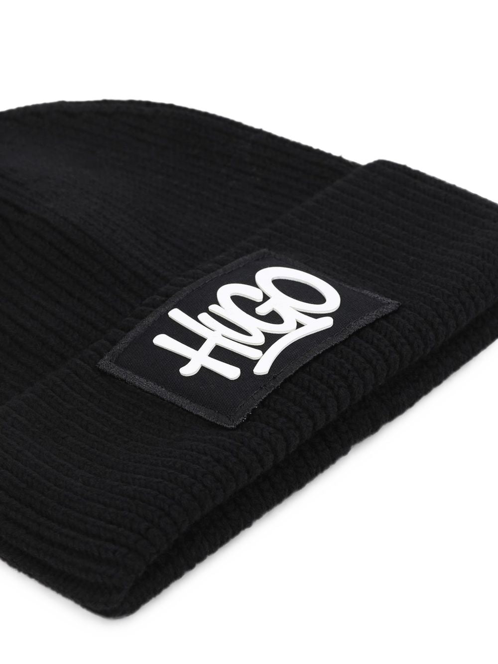 In maglia beanie. Textile label con high density branded. Mixed composition, mostly cotton: co/pl. Unisex style. G01316 09B HUGO KIDS 