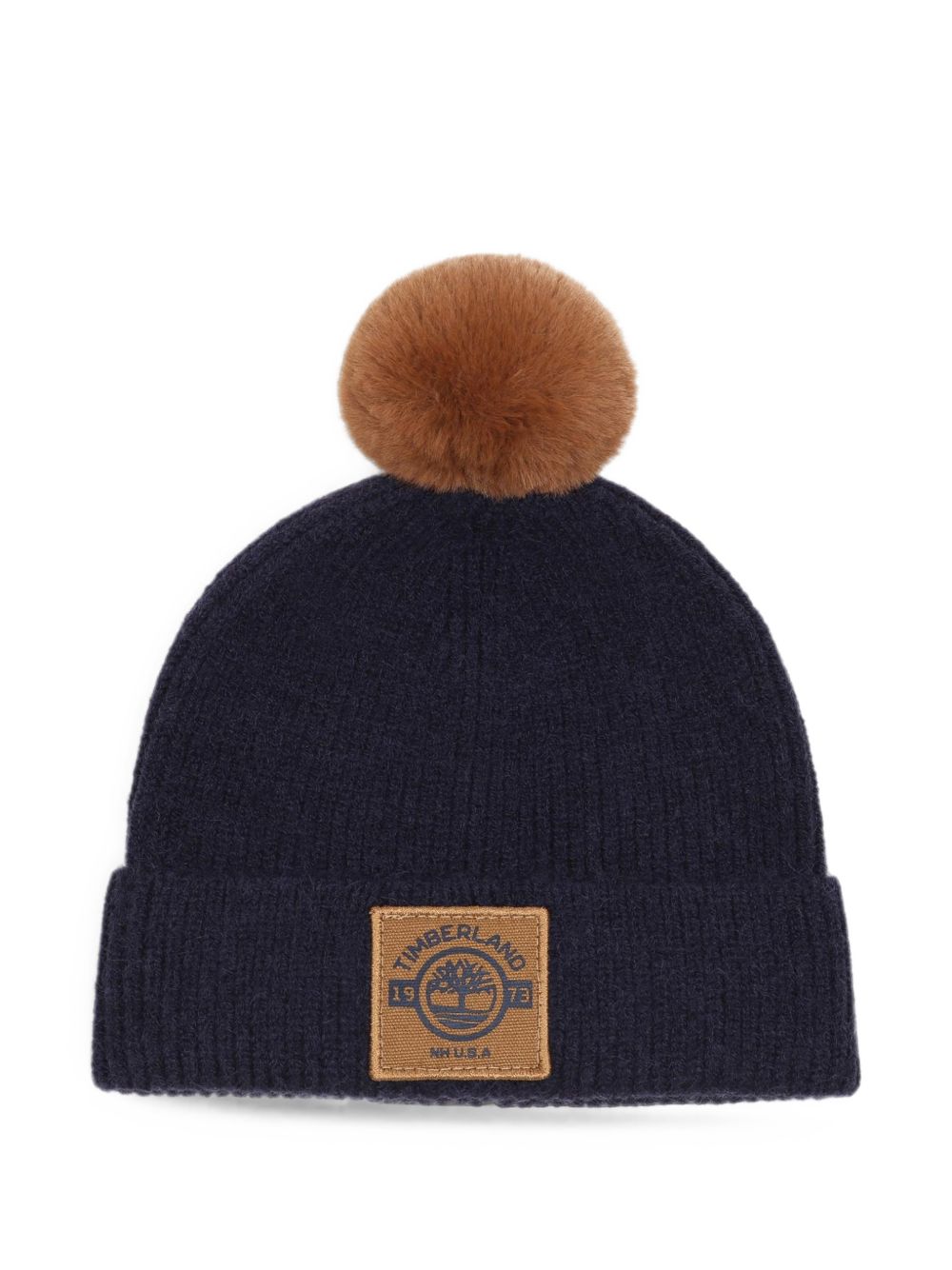 In maglia beanie con turn up e eco-pelliccia pompom. Badge con branded stampa. Mixed composition: pc/pl/pa. T61095 849 TIMBERLAND KIDS 