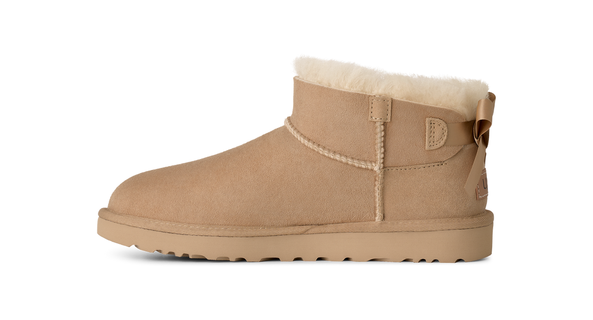 Stivaletti con fiocco beige 1185491 SAN UGG 