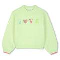 Maglione in maglia, filato morbido lucido, applicazioni in plastica con multicolore paillettes flottanti sul davanti.