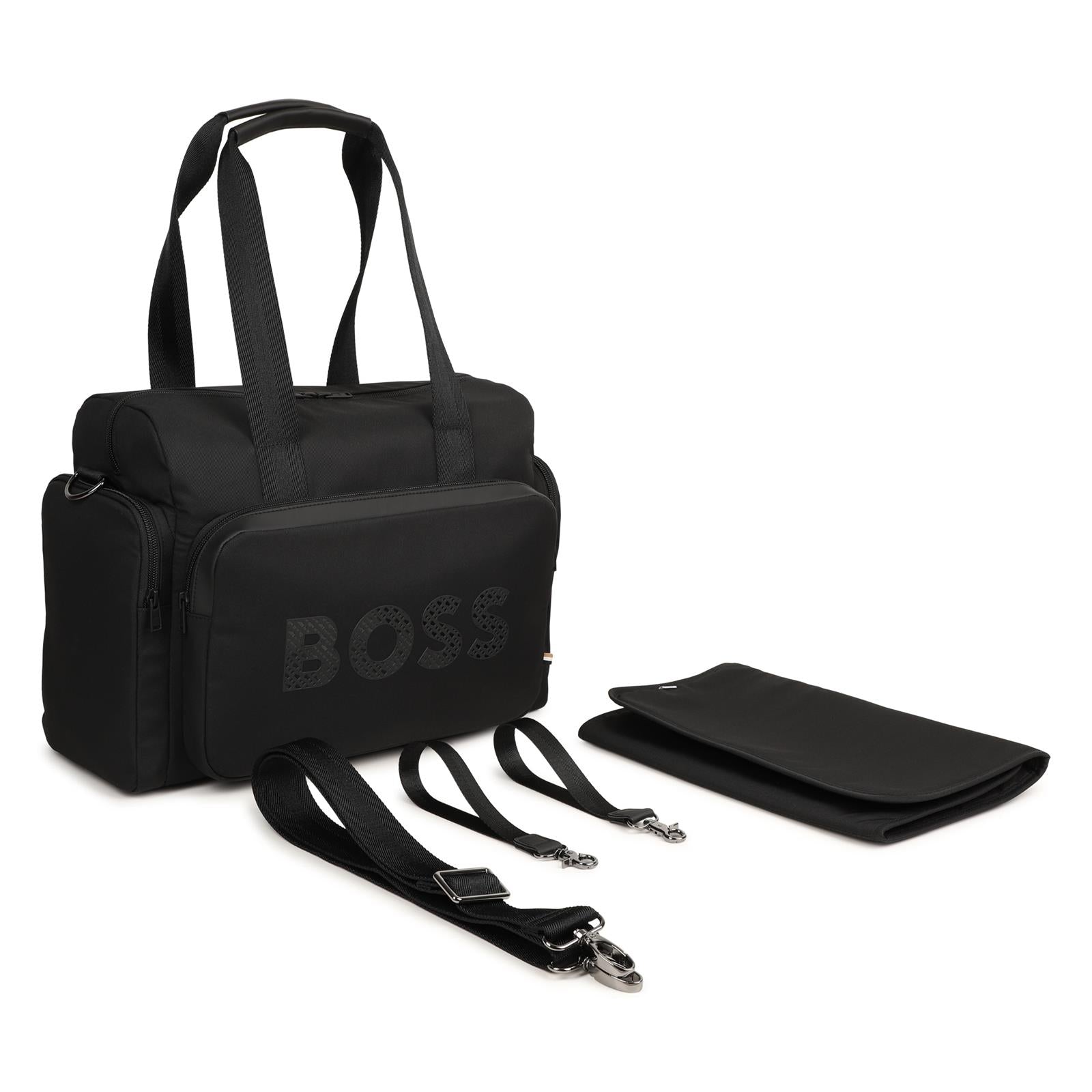 Changing bag in matt polyester e gum effect simili (in details). Double b all-over stampa inside logo on davanti. Tricolor woven tab. Changing mat + 2 stroller straps + removable strap e handles in textured jacquard. External large tasche. Tasche on  J53561 09B BOSS KIDSWEAR 