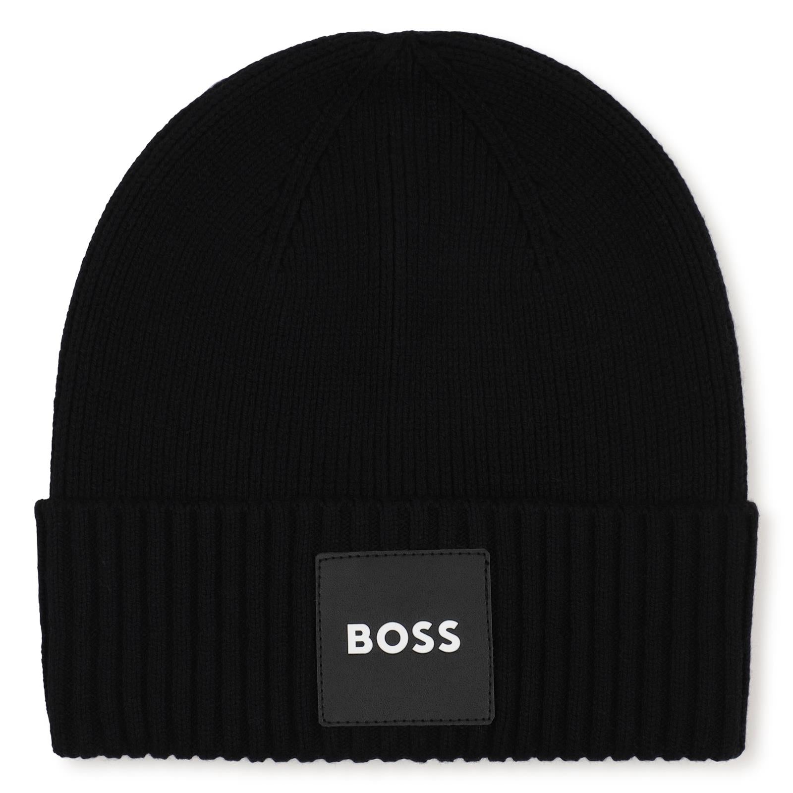 Knit beanie con branded badge. Mainly made in cotton, co/pa. Matched snood j53590 J53583 09B BOSS KIDSWEAR 