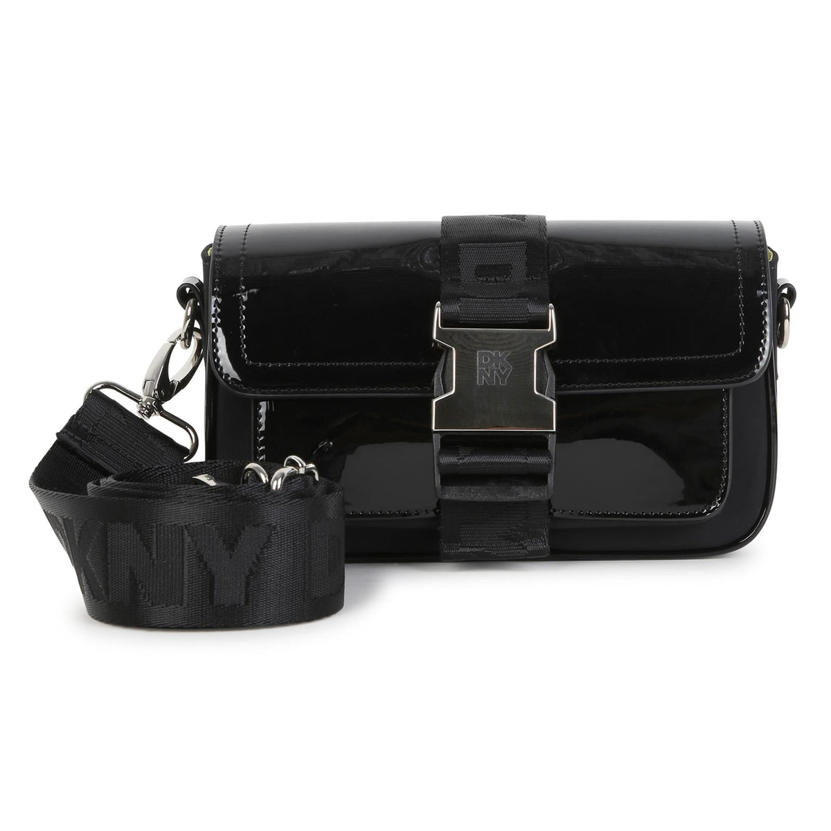 Bi-material handbag in glossy simili e mat fabric. Regolabile e removable strap. Chiusura by branded strap e metal branded buckle. Colored fodera. Dimensions : 12x20x5.5cm. D62931 09B DKNY KIDS 