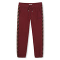 Cotton from organic farming cotone garzato pantaloni, vita elastica con coulisse embellished con branded silver metal ends, curb braid applied on legs