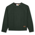 85% cotton / 15% wool in maglia felpa, different knit stitch pattern on sides, printed logo on paper label at fondo.