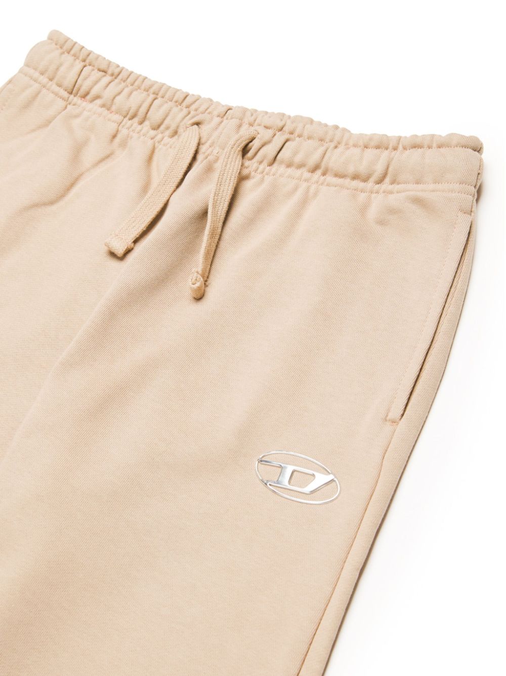 Beige trousers with Oval-D plaque