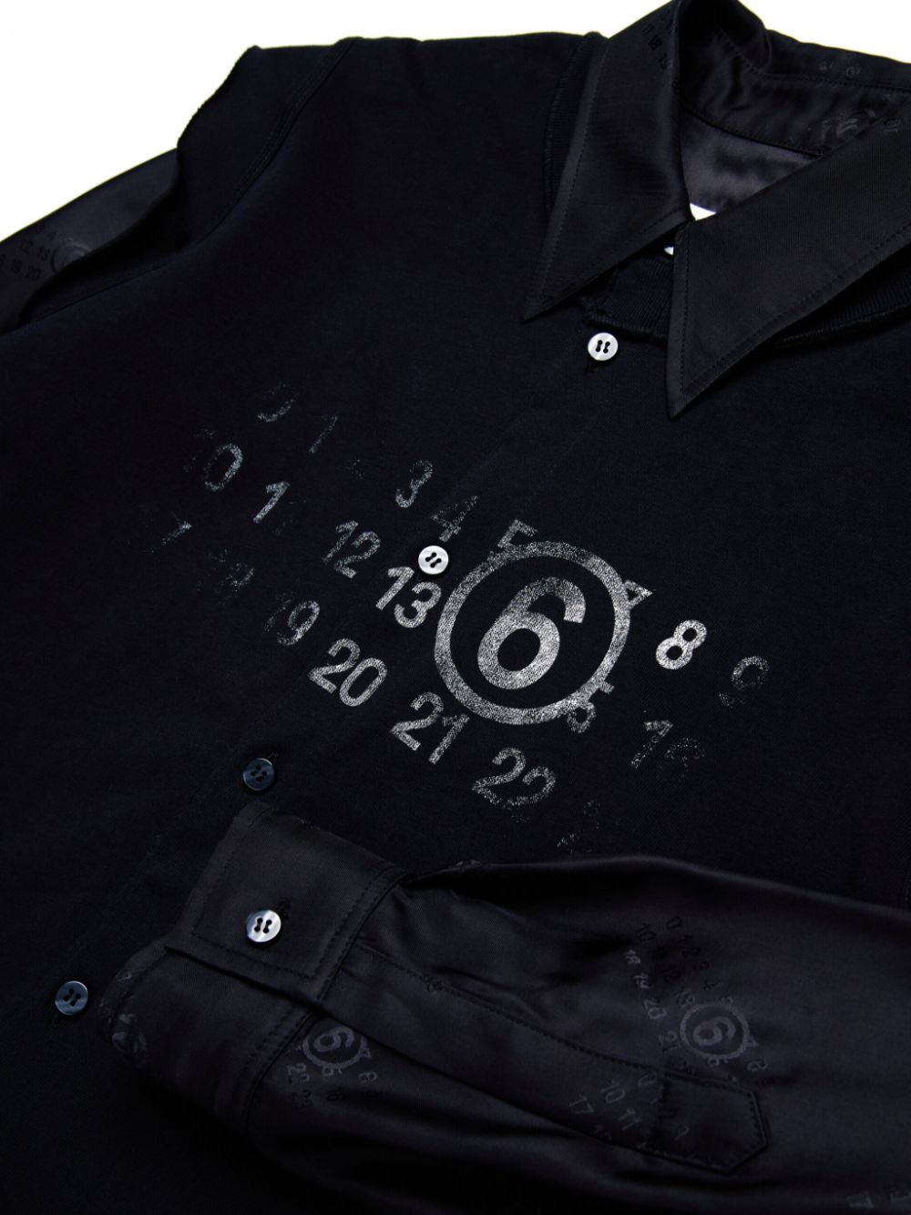 Black shirt with all-over number logo