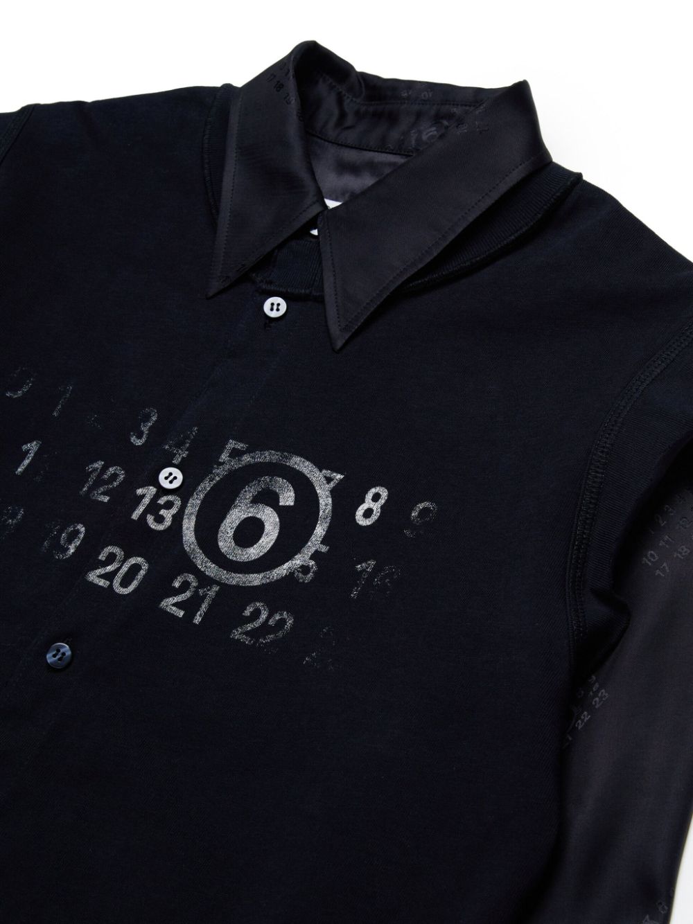 Black shirt with all-over number logo