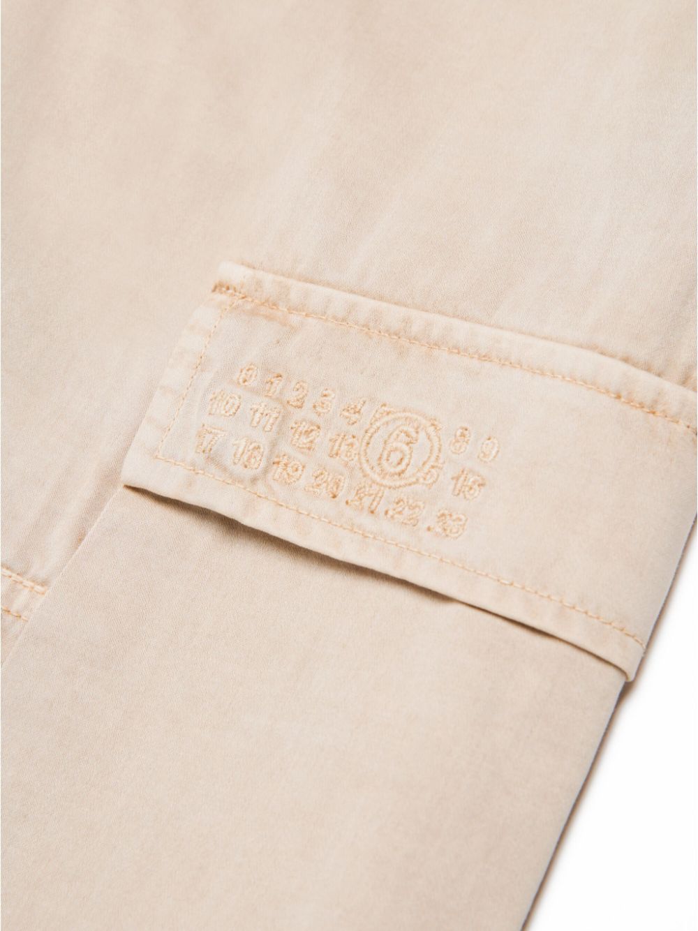 Beige cargo pants with number logo