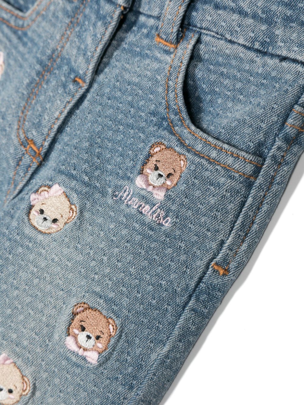 Baby girl's jeans with teddy bear embroidery