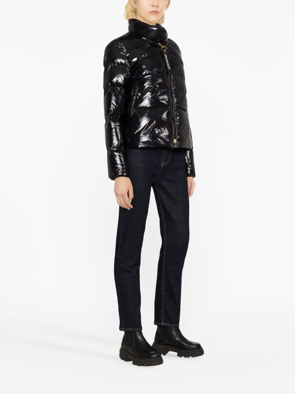 Black padded jacket with patent leather effect