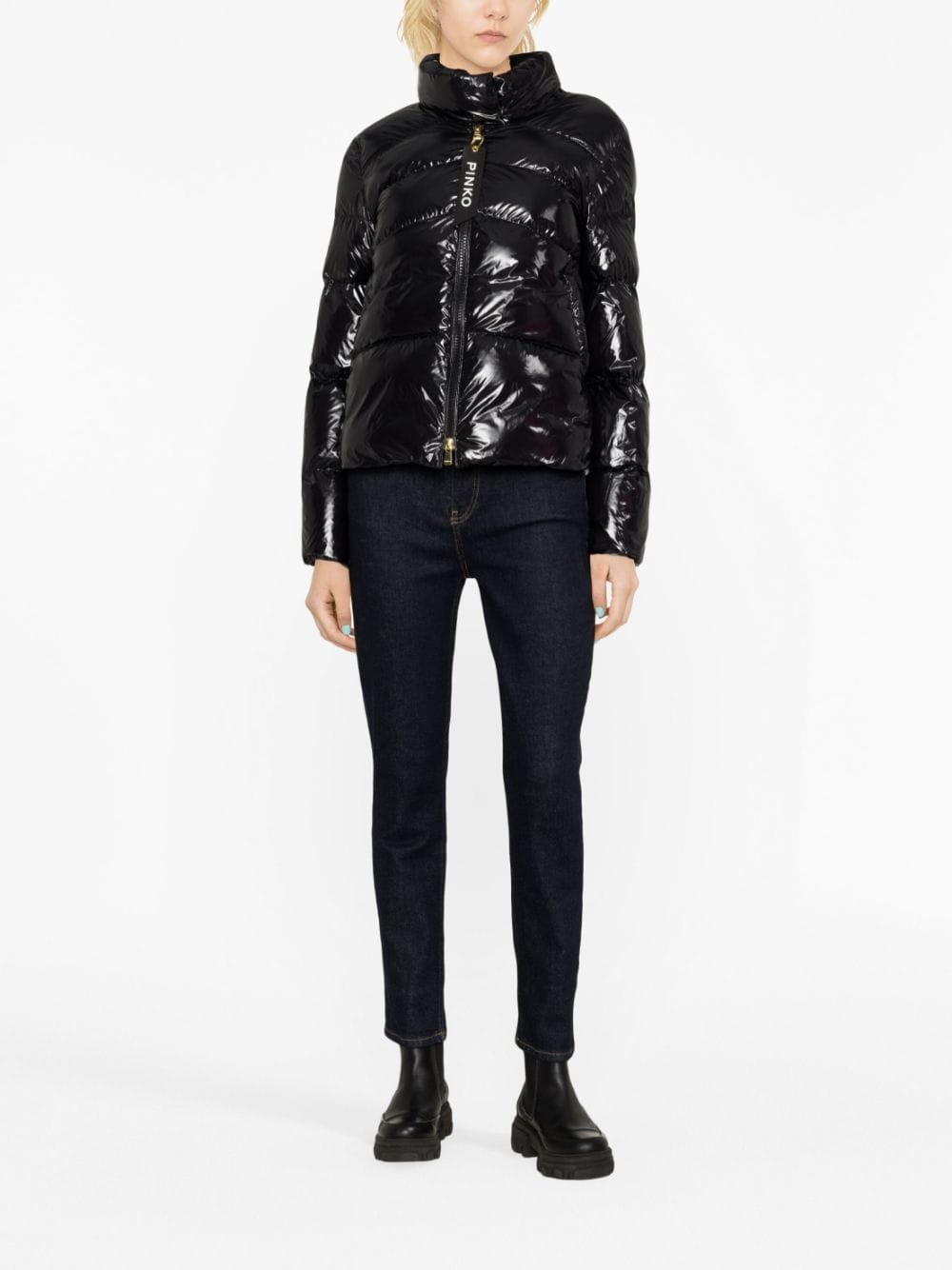 Black padded jacket with patent leather effect