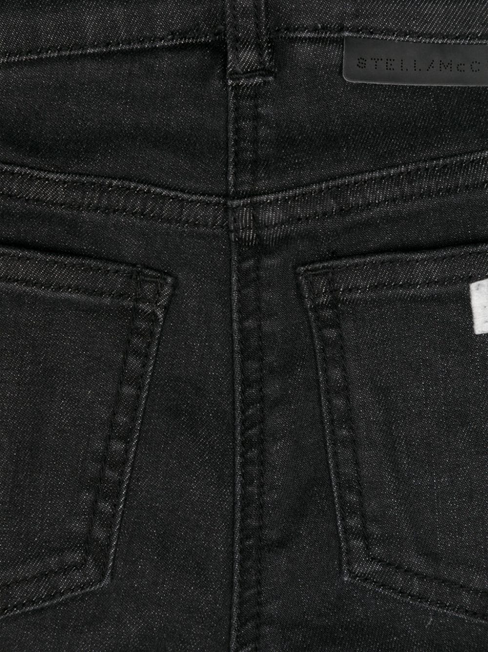 Black flared jeans with side logo