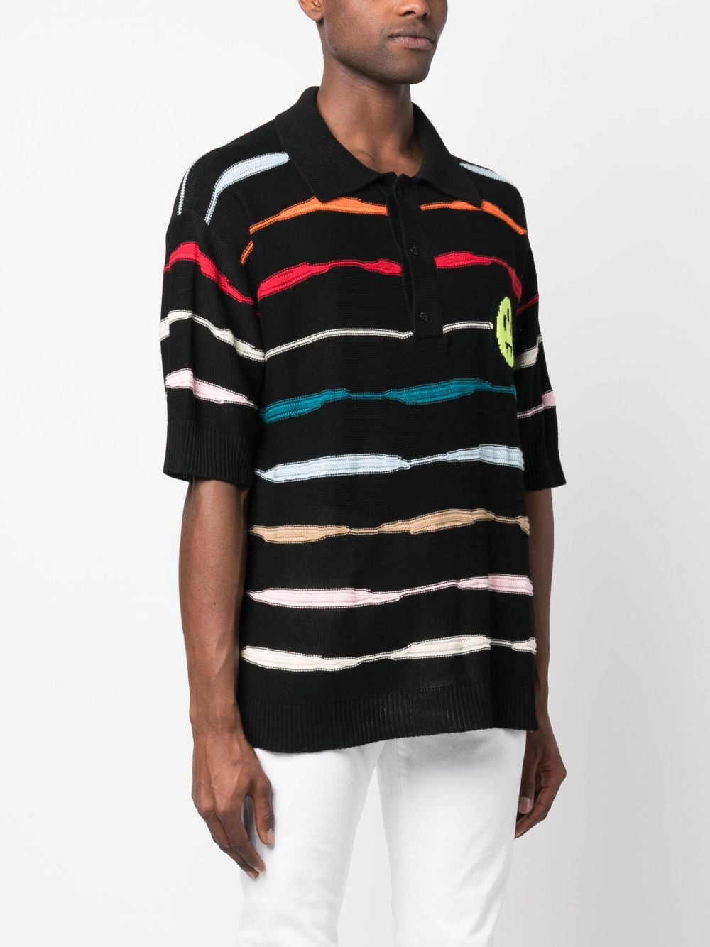 Black polo shirt with multicolor horizontal stripes