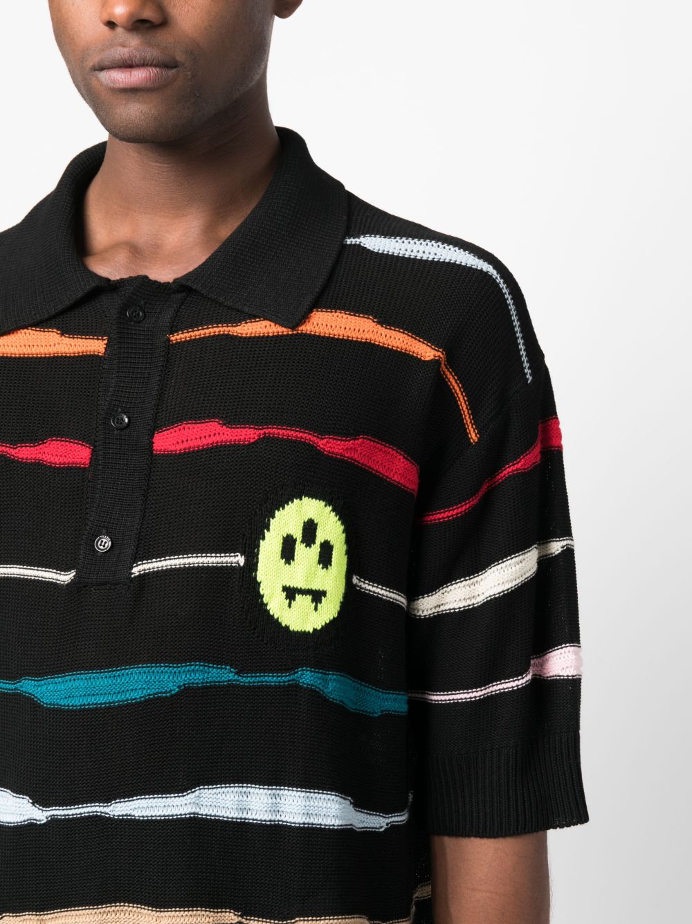 Black polo shirt with multicolor horizontal stripes