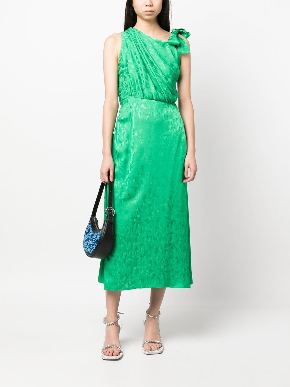 Green empire dress with all-over motif