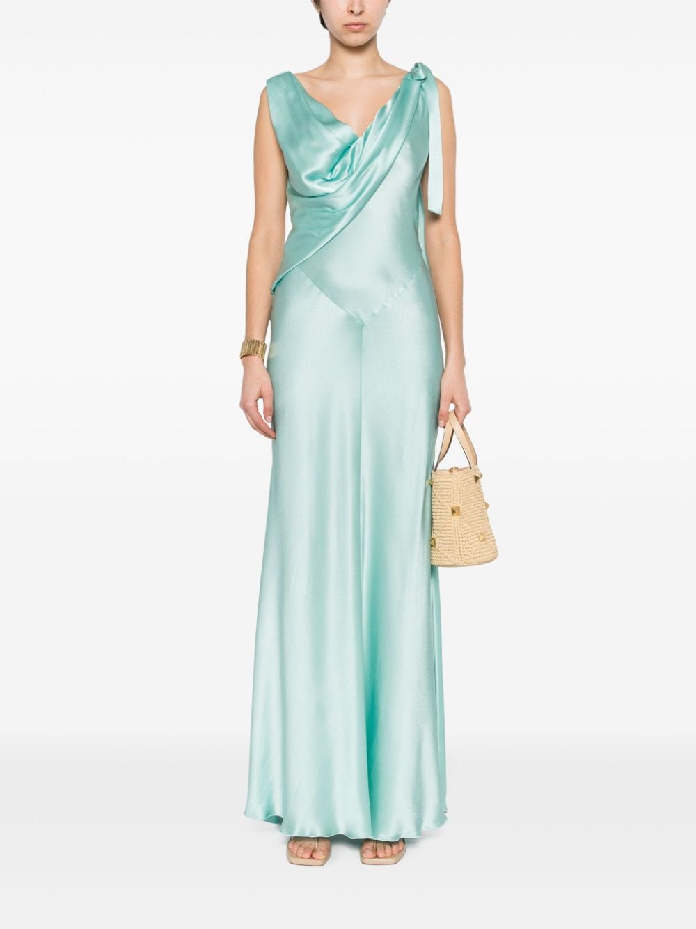 Long light blue dress with draped neckline and silk