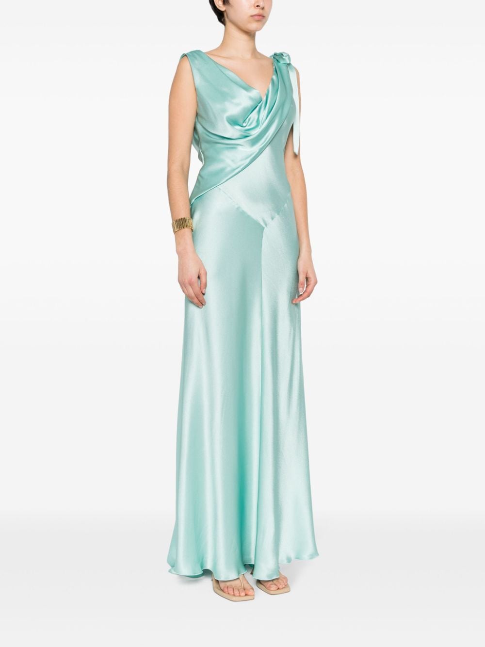 Long light blue dress with draped neckline and silk